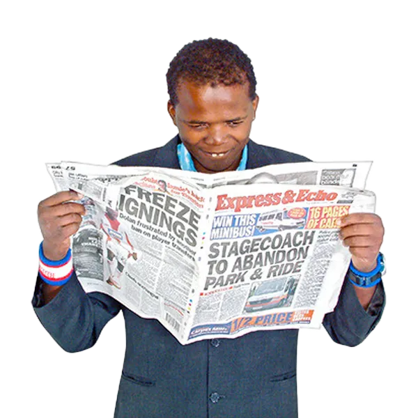 man reading newspaper